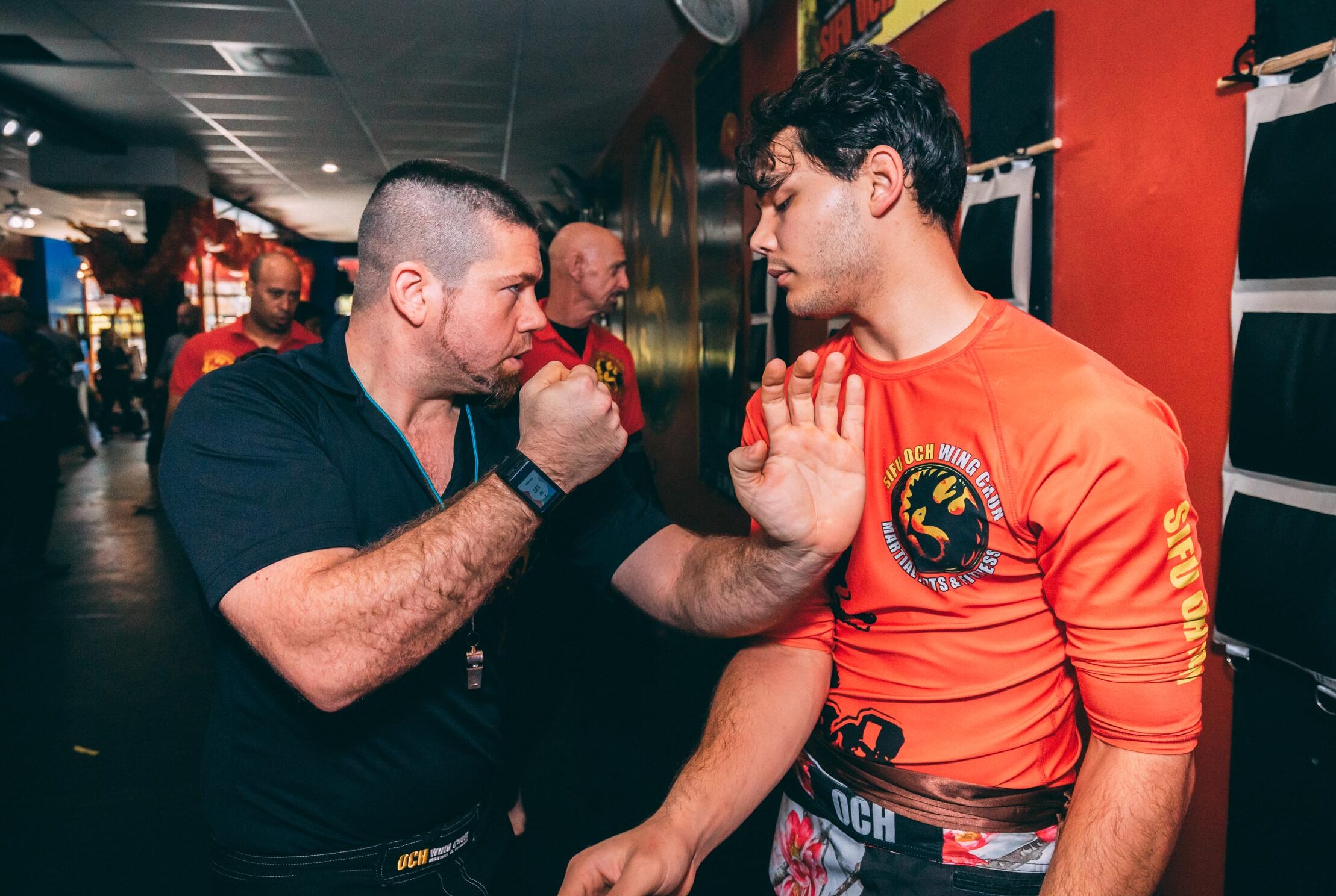 sifu justin och demontrating a wing chun martial arts technique against student